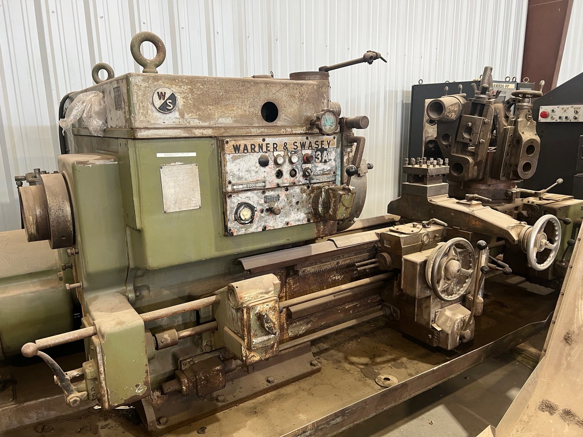 A Warner and Swasey Lathe, a classic industrial lathe with durable construction, precise machining capabilities, and versatile functionality for metalworking operations.