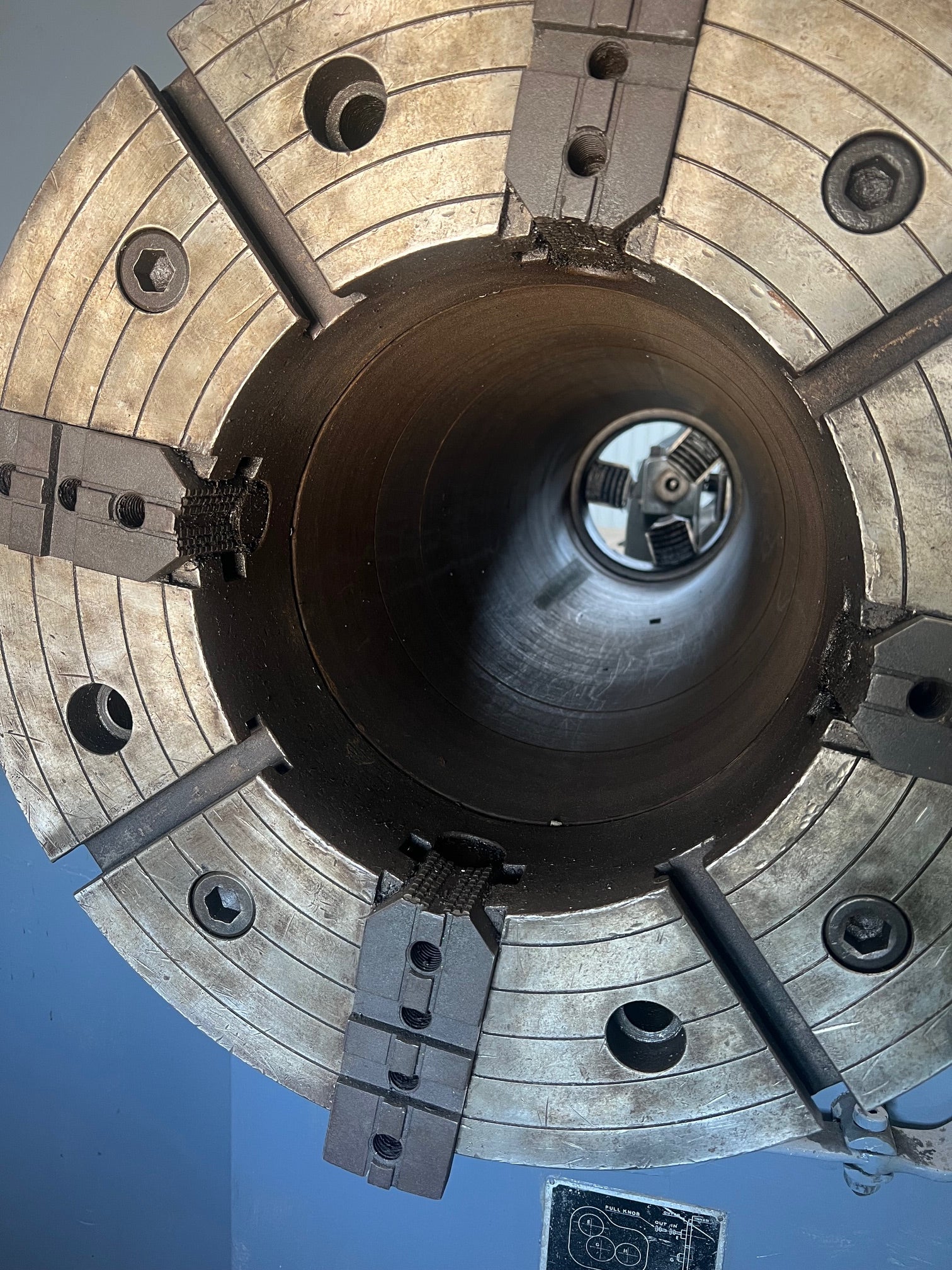 An industrial-sized Lodge and Shipley Lathe, a heavy-duty machinery with metallic components, gears, and control panels, ready for manufacturing processes.